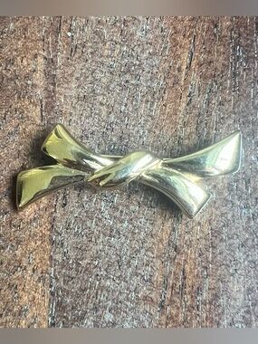 Monet Goldtone Bow brooch